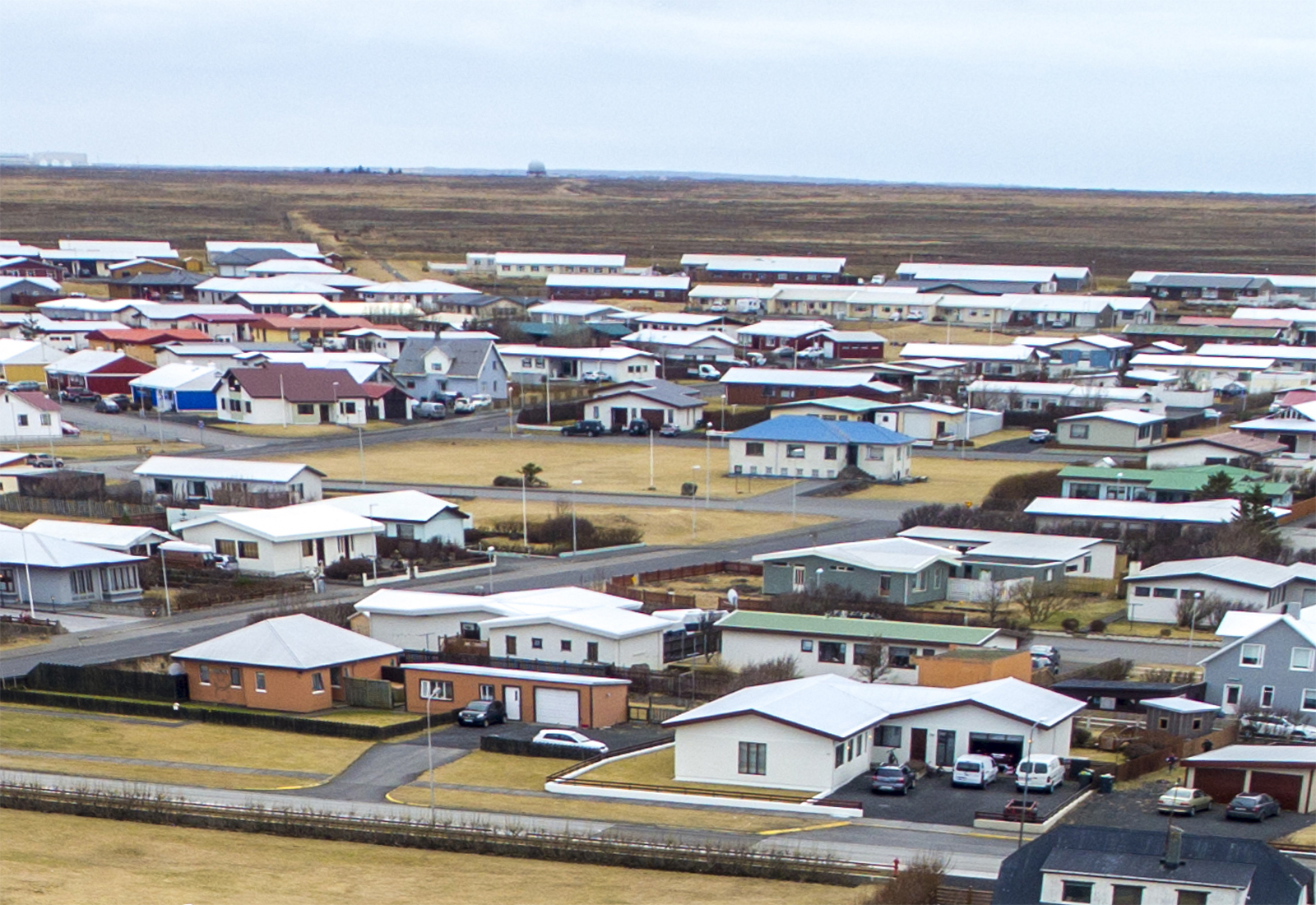 Heitar umræður um fjölbýlishús í einbýlishúsabyggð í Garði